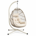 Sillón colgante de acero y mimbre sintético crema